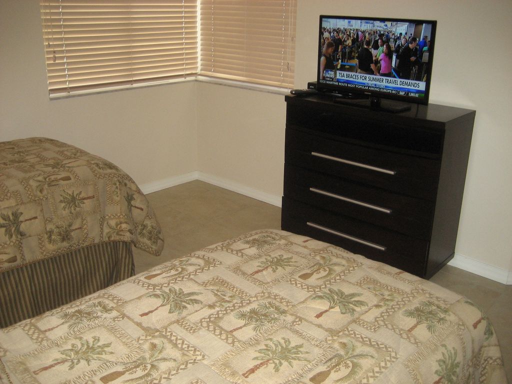 Guest Bedroom two singles, 32 inch TV and New Cabinet furniture