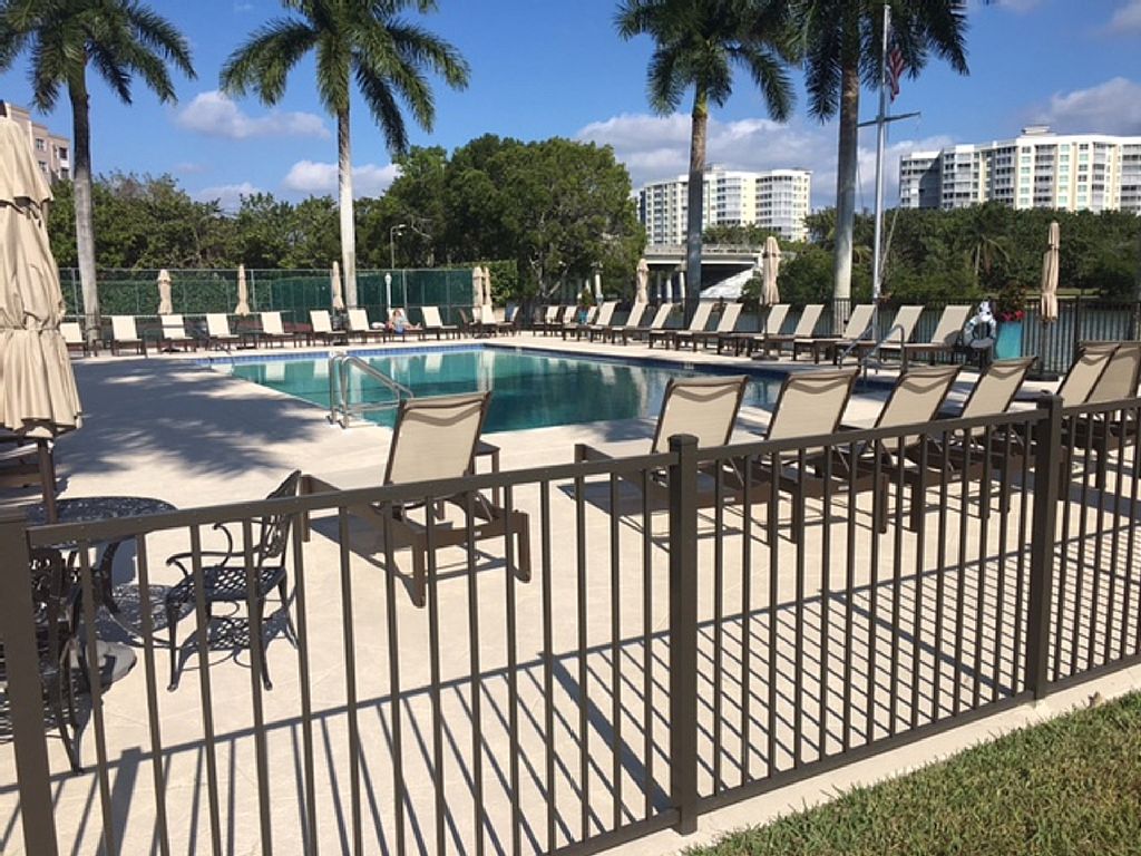 New Pool surface, New Furniture, New Fence and deck, 30'x60' great Views of Bay at Naples condo rental